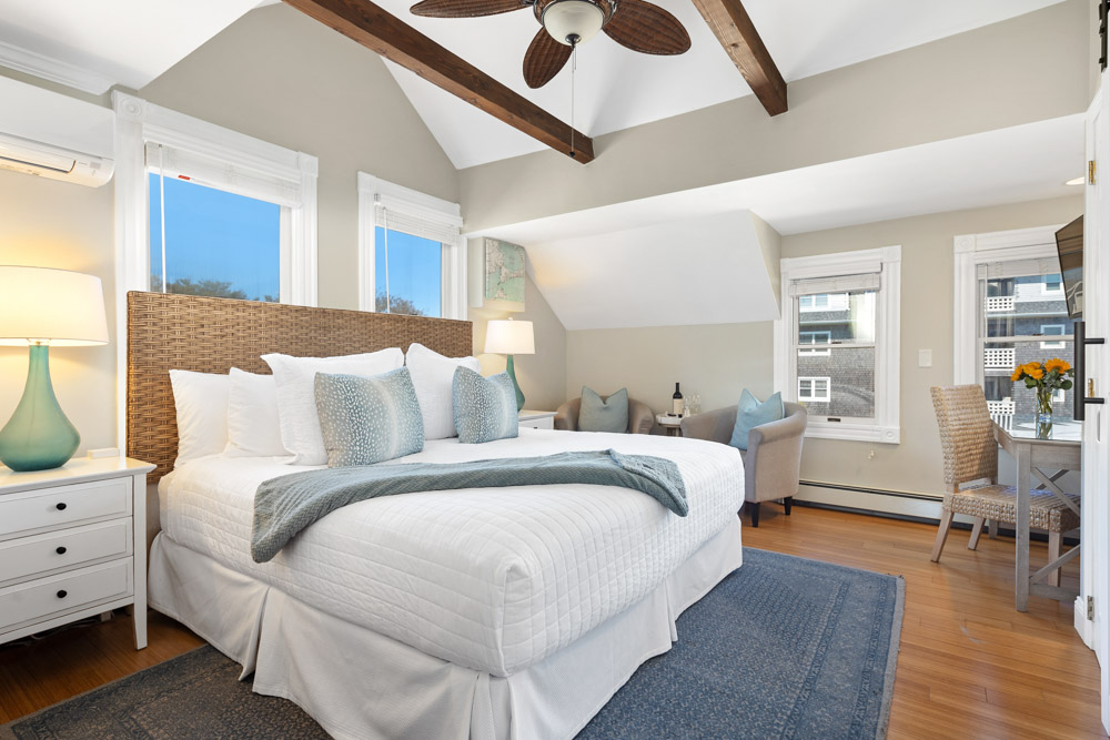Juniper Point offers a king bed, private bath with walk-in shower, and a lovely partial ocean view.