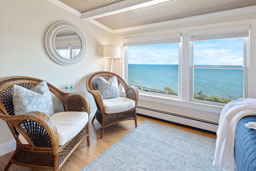 cape cod oceanfront bed and breakfast room with view and sitting chairs